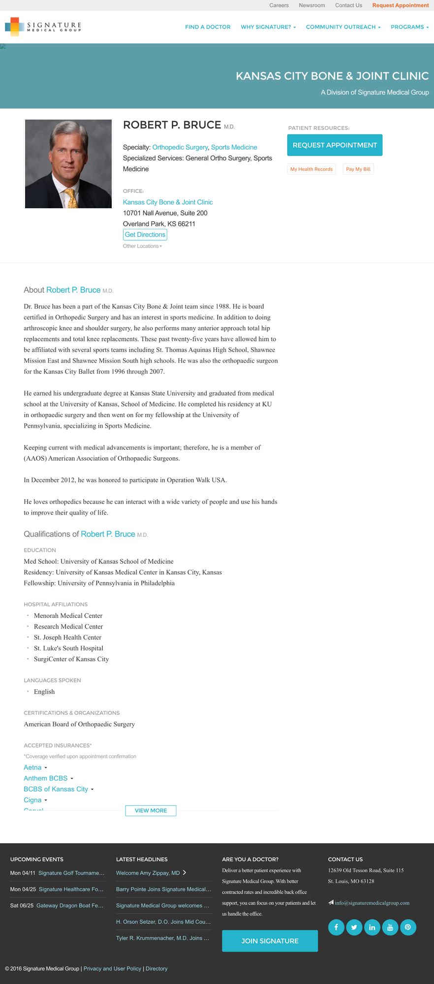 Robert P. Bruce's physician page: a teal band carrying KANSAS CITY BONE & JOINT CLINIC above A Division of Signature Medical Group, then his portrait beside his name, specialty, specialised services and office address, with Request Appointment set opposite; below, an about section, education, five hospital affiliations, languages, certifications and accepted insurances