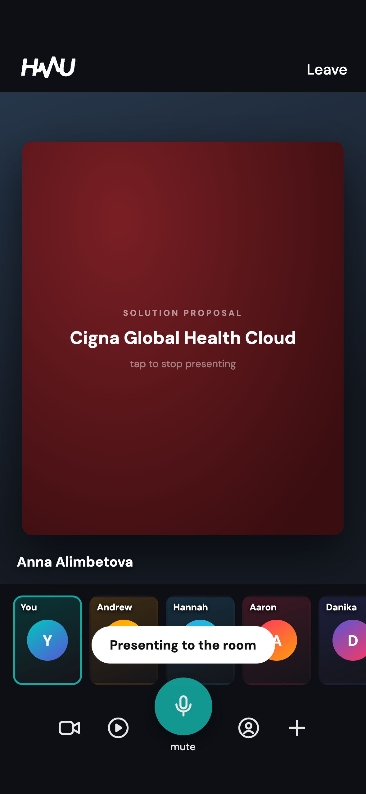 The proposal on screen in the video room, headed “Solution Proposal: Cigna Global Health Cloud”, with a “Presenting to the room” toast across the participant tiles.